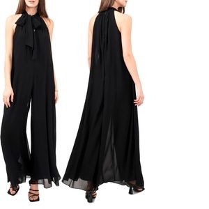 Sleeveless jumpsuit (lined) featuring a pleated halter neck, wide-leg design.